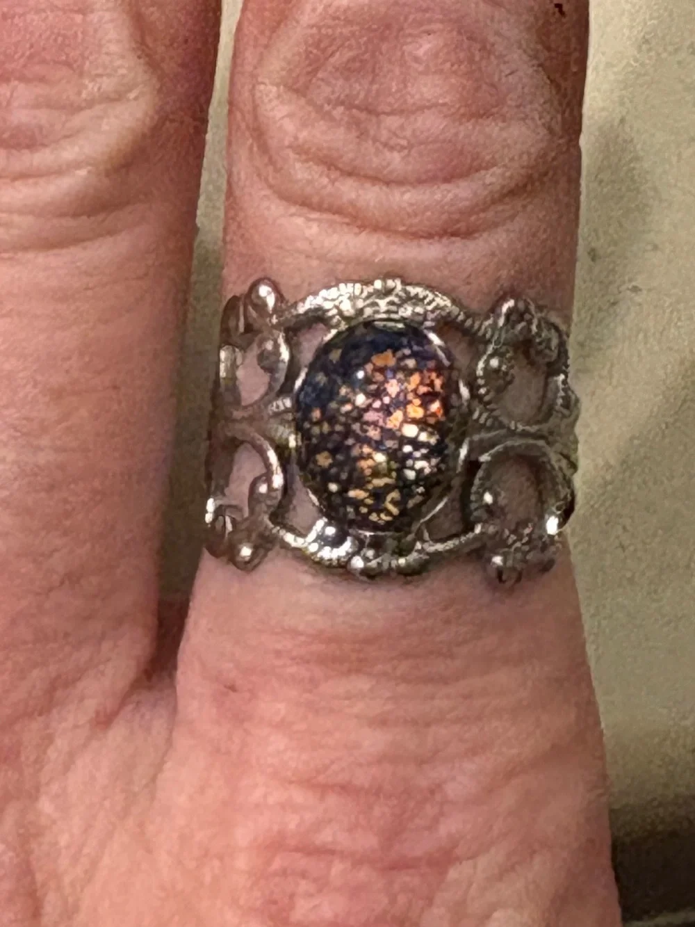 Vintage silver filigree ring with glass fire opal